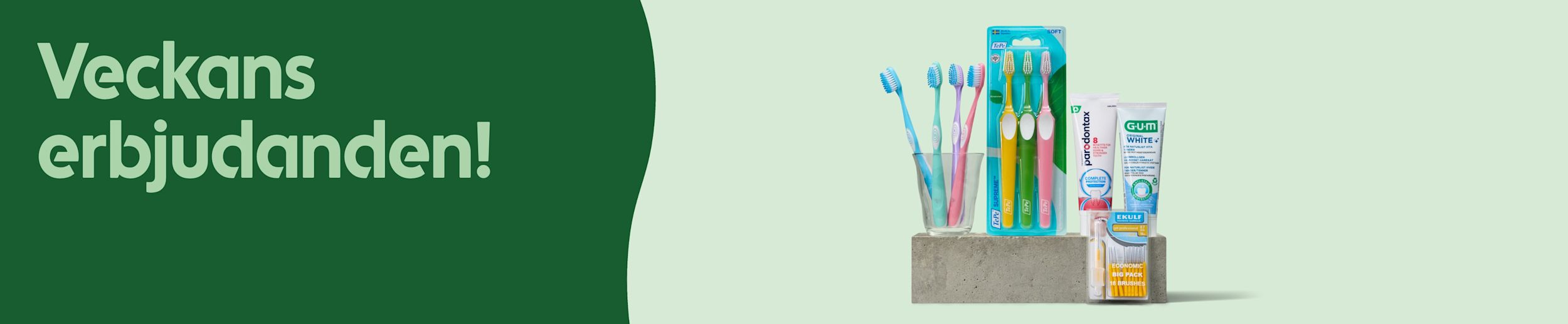 Flera tandborstar i glas och förpackningar tillsammans med tandkräm och mellanrumsborstar på en betongyta mot en ljusgrön bakgrund. Text: Veckans erbjudanden!
